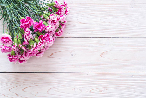 pink spring flower on wooden background - Photo, Image
