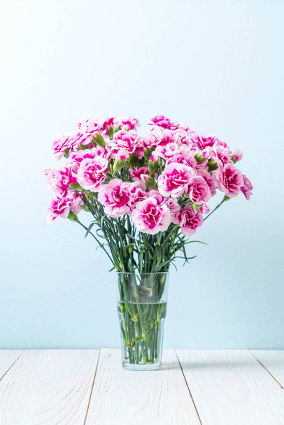 pink spring flower on wood background - Photo, Image