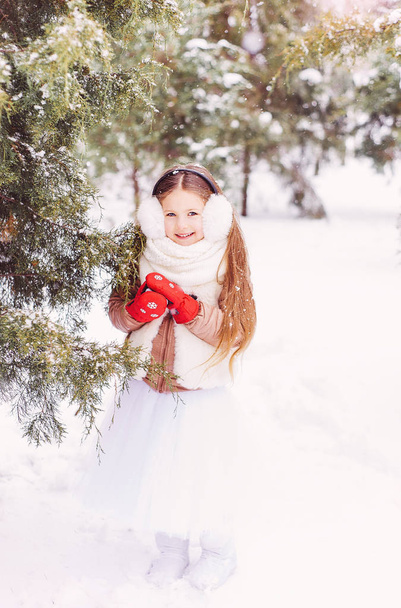 portrait of a cute girl in the forest, winter, cold - Photo, Image