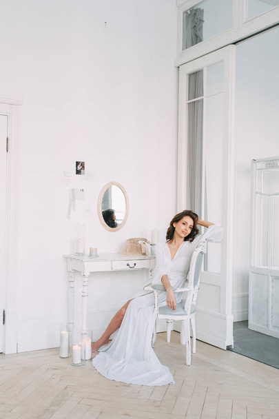 Easy spring morning of the bride in the Scandinavian style in the Studio with stylish decor and European-style needles - Zdjęcie, obraz