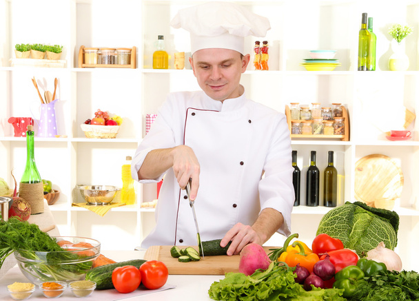 Chef cooking in kitchen - Foto, Imagen