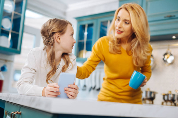Serious mother and daughter talking - Photo, Image