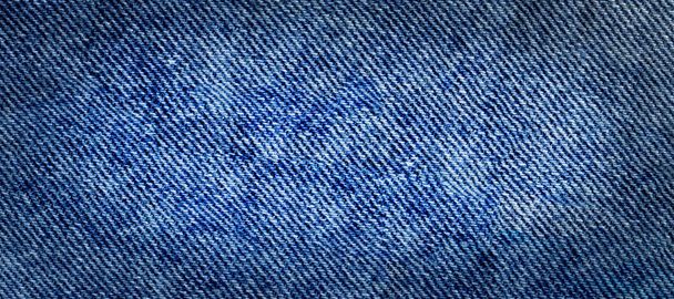 ジーンズ繊維の質感をクローズ アップ。ジーンズ デニム バック グラウンド - 写真・画像