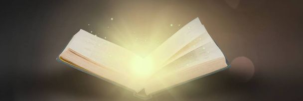 Digital composite of Opened book on gray background with light - Photo, Image