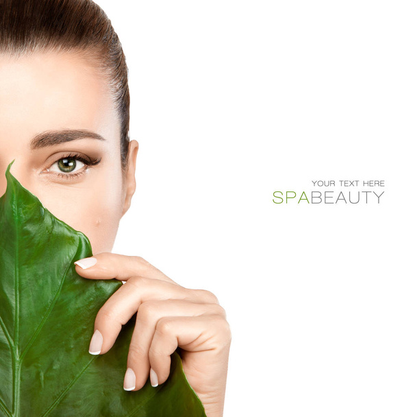Beauty Spa Woman with a Fresh Leaf over Face - Photo, Image