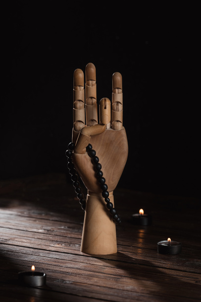 wooden hand with prithvi mudra gesture - Foto, Imagen