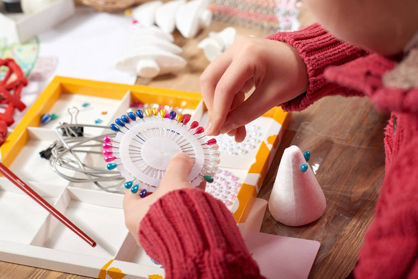 Child make crafts and toys, handmade concept. Artwork workplace with creative accessories. - Photo, Image
