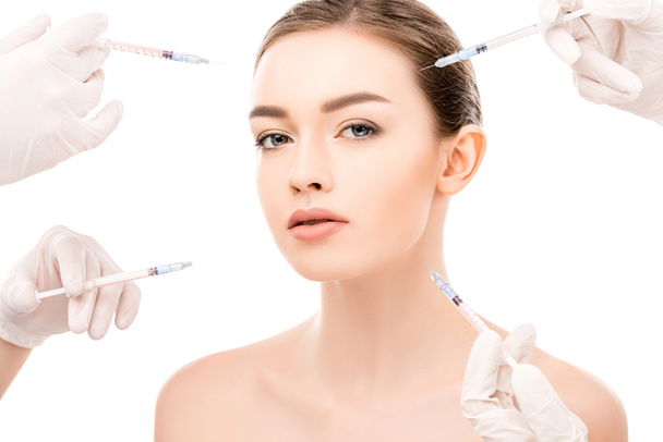 attractive girl with perfect skin doing beauty injections, isolated on white - Фото, изображение