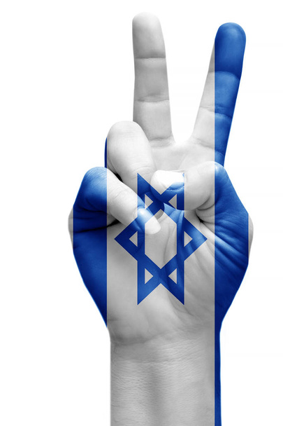 and making victory sign, Israe painted with flag as symbol of victory, win, success - isolated on white background - Photo, Image