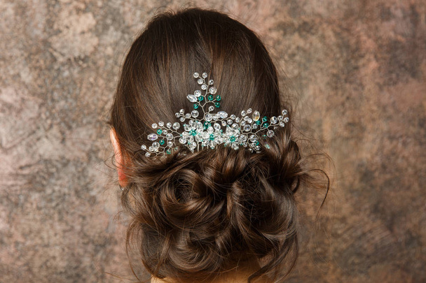 Image from back of brunette with hairdo and diadem - Fotó, kép