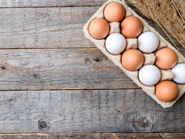 Ingredients for Breakfast Oatmeal Eggs Bread Apple Rustic Wooden background Copy space - Foto, Imagen