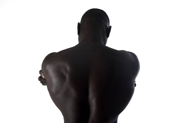 ő vissza fekete sportos férfi a hátán a fekete sportos férfi képmása portréja - Fotó, kép