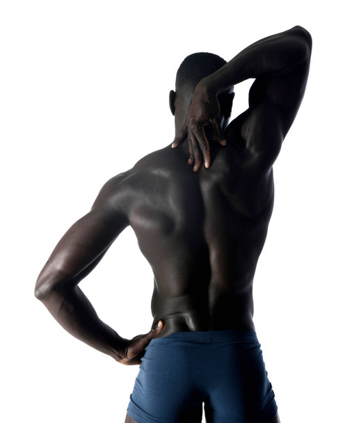 portrait of a black athletic man on his back - Foto, imagen