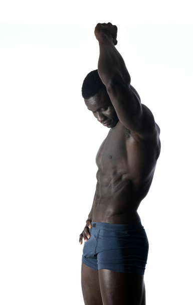 portrait of a muscular man on white background - Valokuva, kuva