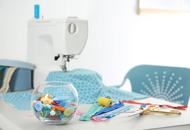 Colorful buttons and sewing accessories on table, closeup - Foto, Imagem