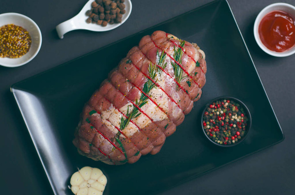 Raw Uncooked Pork, Rolled Meat with Herbs and Seasoning - Photo, Image
