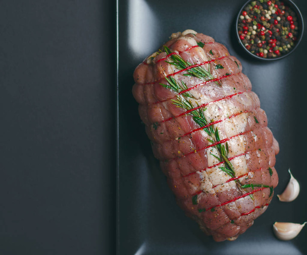Raw Uncooked Pork, Rolled Meat with Herbs and Seasoning - Photo, Image