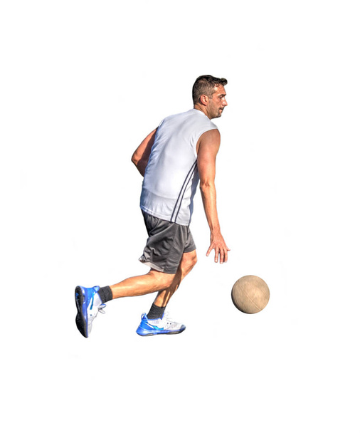 Side view of a basketball player dribbling on white  - Photo, Image