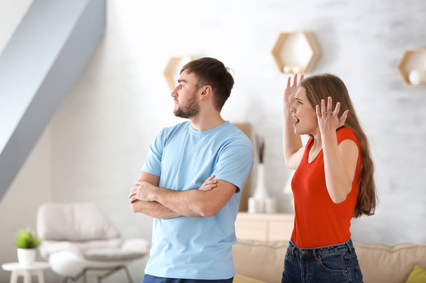 Couple arguing at home. Problems in relationship - Foto, imagen