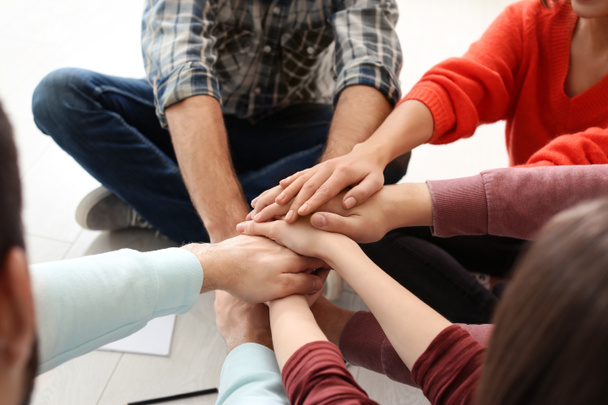 People putting hands together, closeup. Unity concept - Photo, Image