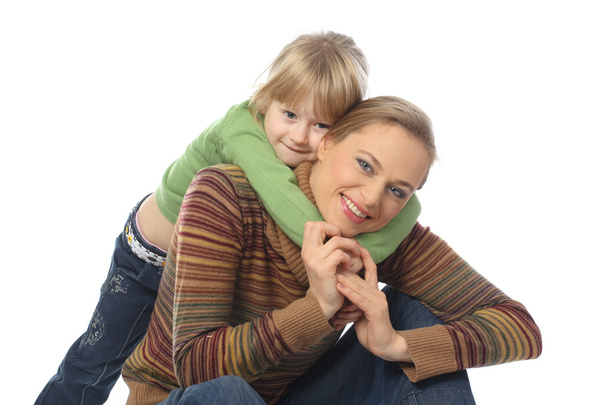 Portrait of adorable young girl and mother - Foto, afbeelding