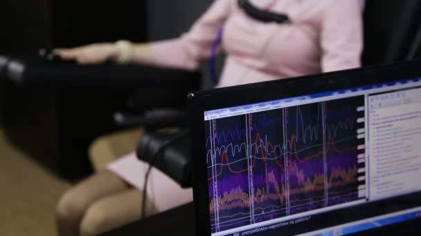 Lie-detector test, a woman answers the questions of the expert - Footage, Video