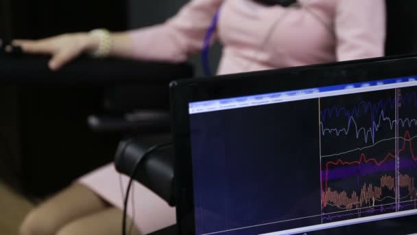 Lie-detector test, a woman answers the questions of the expert - Footage, Video