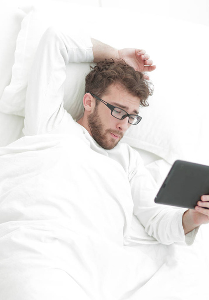 background image . modern man reading on digital tablet. - Foto, afbeelding