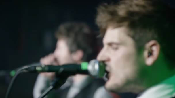 men singing at concert, musician band performance - Felvétel, videó