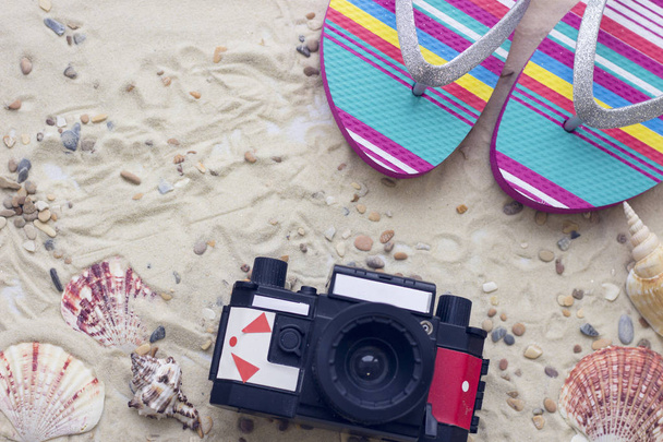 Vacation accessories on sand background - Photo, Image