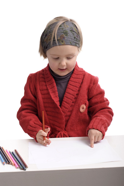 little girl drawing with pencils - 写真・画像