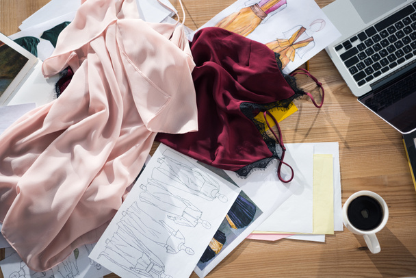 top view of messy fashion designer workplace - Photo, Image