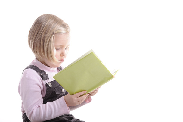 Little girl reading - Photo, image