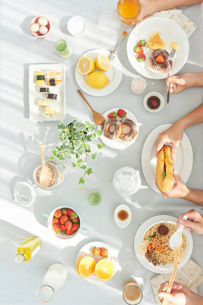Fresh food on breakfast table, view from above - Photo, Image