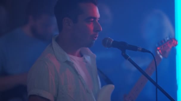 4K Live band performing for young nightclub crowd - Felvétel, videó