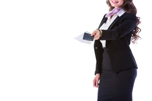 cropped image of stewardess giving passport with tickets isolated on white - Φωτογραφία, εικόνα