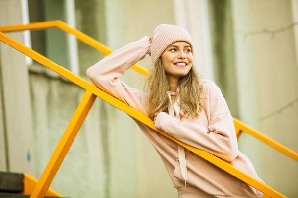 cool young woman in pink hoodie - Fotografie, Obrázek