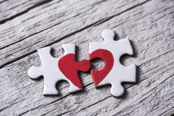 puzzle pieces which form a heart - Foto, afbeelding