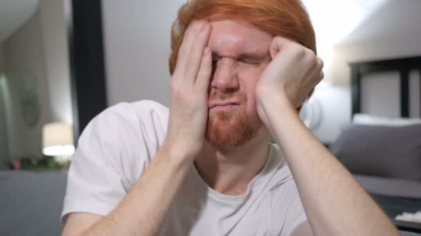 Tired Casually Sitting Redhead Man, Close up - Záběry, video