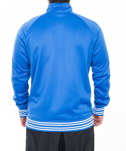 chaqueta deportiva azul sobre fondo blanco
 - Foto, Imagen