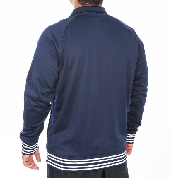 chaqueta deportiva azul sobre fondo blanco
 - Foto, Imagen