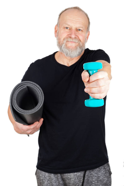 Senior man holding sport accessories - Foto, Bild