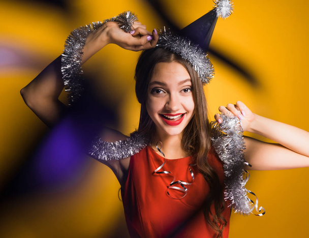 happy woman in festive hat in beautiful dress - Fotoğraf, Görsel
