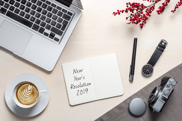 New year's resolution 2019 written on open notepad as flatlay - Фото, изображение