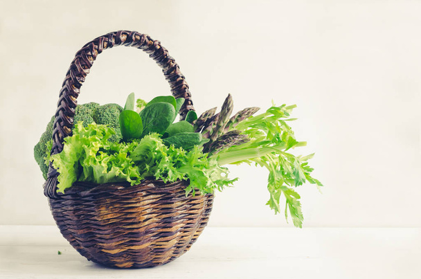 Assorted green vegetables in a basket - 写真・画像