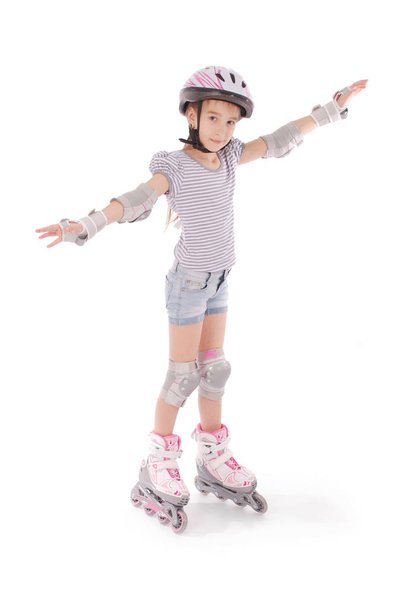 Little pretty girl on roller skates - Photo, Image