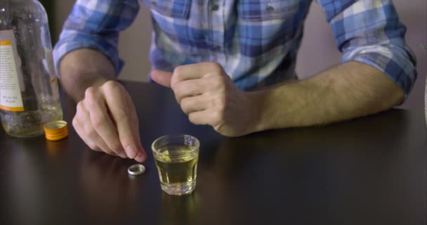 Man drinks alcohol while thinking about divorce - Footage, Video