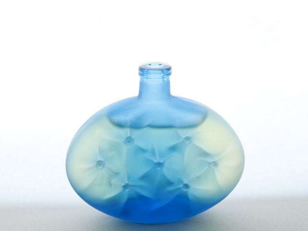 Frasco de perfume azul
 - Foto, Imagen