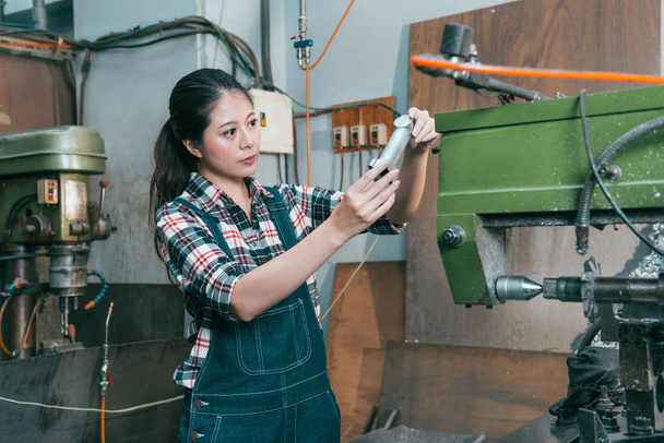 professional lathe machining factory woman worker - Foto, Bild