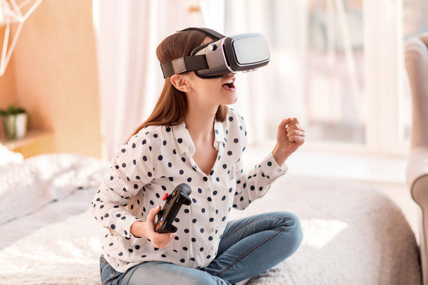 Appealing nice woman connecting to VR - Fotoğraf, Görsel